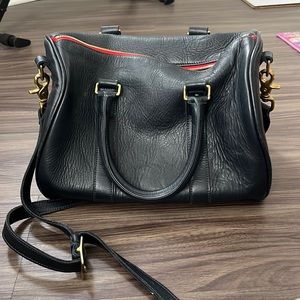 Navy shoulder and hand barrel bag